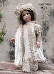 Collectible porcelain dolls - Porcelain dolls Montedragone - Doll Sandra Panna - Collectible porcelain dolls of bisque. Height: 42 cm.