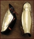 Pair of greaves, brass