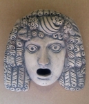 Terrecotte Pompei Ercolano Museum - Bassorilievo tratto dal Teatro Romano sec.II d.C., scultura in terracotta, le maschere nell'antichità servivano per ornare le parete delle abitazioni.