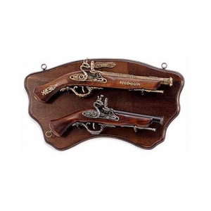 Panel with two flintlock pistols, Medieval - Firearms - Flintlock pistols, Old Guns - Panel in shaped wood, provided with two metal rings to hang it from the wall, it holds the not fireable reproductions of two flintlock pistols: the lower is a XVIII century model, size 45 X 25 cms.