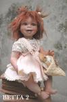 Collectible Porcelain Dolls - Porcelain Dolls - Bisque Porcelain Dolls - Bisque porcelain doll in a sitting position, height: 26 cm.