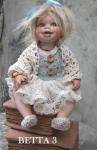Collectible Porcelain Dolls - Porcelain Dolls - Bisque Porcelain Dolls - Bisque porcelain doll in a sitting position, height: 26 cm.