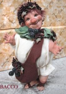 Bacco, bambola in porcellana, Fate Folletti di Porcellana - Folletti elfi in porcellana - Personaggio in porcellana di bisquit collezione Montedragone, altezza: 26 cm