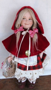 Cappuccetto Rosso media, Bambole porcellana da collezione - Personaggi delle Fiabe in porcellana - Bambola in porcellana di bisquit Dimensione: 21 cm di altezza