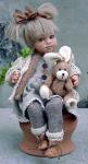 Bambole porcellana da collezione - Bambole porcellana Montedragone - Bambola da collezione in porcellana di Bisquit, bambola in posizione seduta. Altezza 22/34 cm.