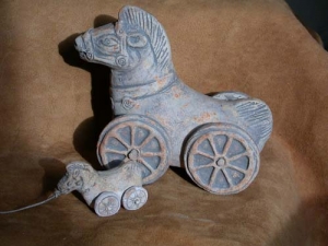 Wagon Zoomorphic Greek, Terracottas Museum Pompeii Herculaneum - reproduction of a little cart zoomorphic greek 4th century B.C.,; Cavallino wheeled mobile, fixed on wooden pins, allow him to be dragged. The model is a toy terracotta
