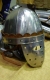 Armature elmi scudi - Elmi medievali - Elmo normanno con maschera a calotta semisferica e corona in cuoio, a protezione del capo e della faccia, interamente realizzato in acciaio lavorato a mano.
