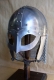 Armours - Medieval Helmets - Viking Helmet Gjermundbu and chainmail drape in Steel; Leather Trim. Viking helmet with a metal mask to protect the eyes and nose, made entirely of iron, handmade with the application of a headset.