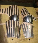 Armours - Medieval Body Armour - Part of medieval armor to protect the legs, fitted with steel slats on leather straps to be worn.