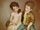 Sibania Porcelain Figurines - Sibania Porcelain Figurines - New - Porcelain sculpture depicting two children sitting, height 10.24in (26 cm). beautiful statue porcelain handmade in Italy.