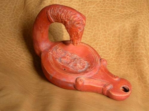 Oil lamp in the Shape of Horse Head, Terracottas Museum Pompeii Herculaneum - Reproduction of a oil lamp in the shape of horse head sec.I DC, terracotta sculpture, ancient oil lamps were used to illuminate the homes.