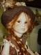 Bambole porcellana da collezione - Bambole porcellana Montedragone - Bambola in porcellana di Bisquit, in posizione seduta, altezza 36 cm.