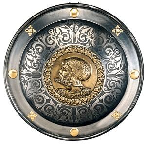 Scudo - Rotella spagnola, Armature elmi scudi - Scudi medievali - Riproduzione di uno scudo di forma circolare e profilo convesso, con clipeo al centro in ottone e motivo figurato decorato a sbalzo.