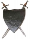 Armature elmi scudi - Scudi medievali - Scudo Medievale in ferro completo di due spade tenuto da un sostegno, scudi in uso nel Medioevo, dimensioni: 80 x 55 cm.