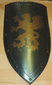Shield Crest Grifo, Armours - Medieval shields - Shield used in the Middle Ages, convex shield to the head and lateral margins arched, pinned down, shows a griffin rampant.