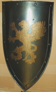 Shield Crest Grifo, Armours - Medieval shields - Shield used in the Middle Ages, convex shield to the head and lateral margins arched, pinned down, shows a griffin rampant.