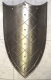 Armature elmi scudi - Scudi medievali - Scudo in uso nel Medioevo a tre punte  rinforzato ai margini con ribattini da ornamento, interamente realizzata in acciaio al carbonio
