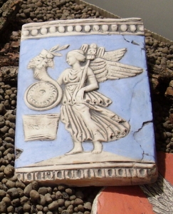 Goddess of Fortune -  Terracotta Sculpture, Terracottas Museum Pompeii Herculaneum - Bas-relief inspired by the decorated top part of a Roman terracotta lamp preserved at Este (Padova), Museo Nazionale Atestino.